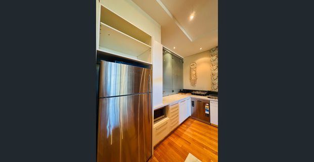 Modern Furnished Apartment with City Views - Photo 1