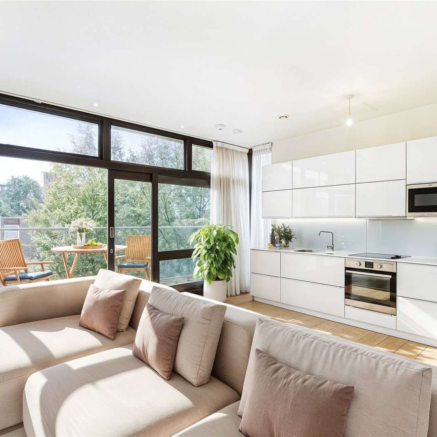 Two bedroom flat on the first floor of a unique development of the former Lillian Baylis School - Photo 1