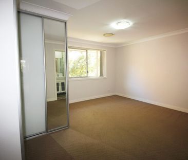 Quiet Secure Tri-level Townhouse with Distant City View & Internal ... - Photo 4