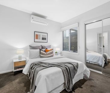 Spacious Two-Bedroom Design with Private Bathrooms - Photo 6