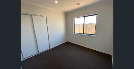 Modern 4-Bedroom Home in a Peaceful Estate - Photo 3