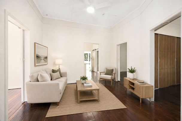 Freshly Renovated Character Home in Sought-After Bardon - Photo 1