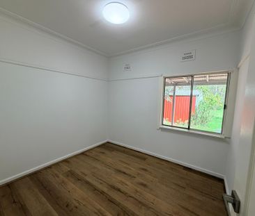 Recently Renovated 4-Bedroom Home - Photo 1