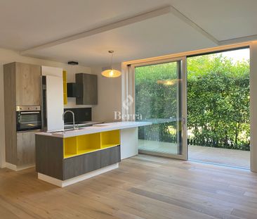Appartement de 3.5 pièces de 75 m² – Rez-de-jardin avec terrasse - Photo 2