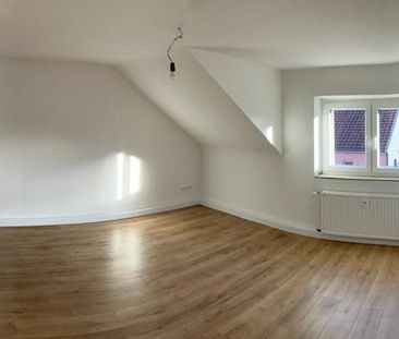Erstbezug nach Komplettrenovierung 2 ZKDB mit 52m² im 2. OG - Photo 1