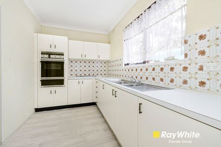 Charming Two-Bedroom Unit in an Ultra-Convenient Setting - Photo 4