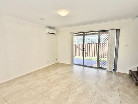 Modern Townhouse In Convenient Location - Photo 1