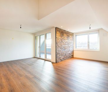 Moderne Maisonette-Wohnung im Herzen von Nänikon - Foto 3