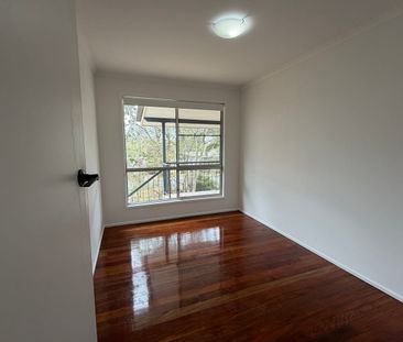Charming High-Set Home with Spacious Backyard! - Photo 2