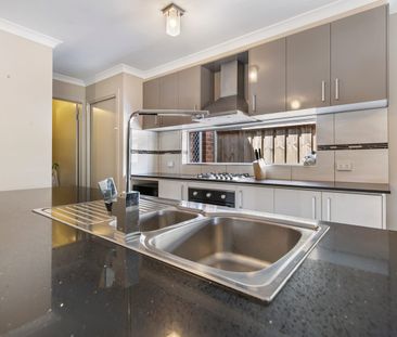 FAMILY HOME IN EXTREME PROXIMITY TO TRAIN STATION! - Photo 5