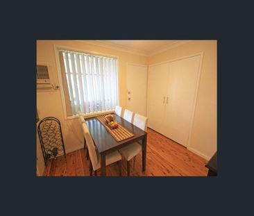 Well-Maintained Three-Bedroom Home - Photo 2