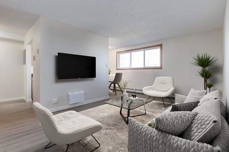 Renovated Suite - 2 Bedroom - Photo 2