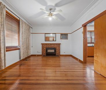 Comfortable 4-Bedroom Home in a Sought-After Location - Photo 4