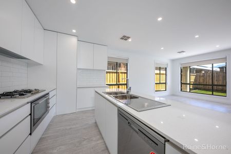 Brand New & Quality Finishes Family Home - Photo 4