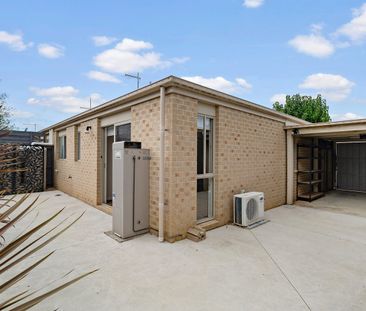 Charming 1-Bedroom Unit with Secure Garden & Carport - Photo 5