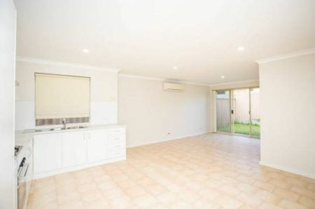 A Bright Three Bedroom Home with Its Own Courtyard - Photo 2