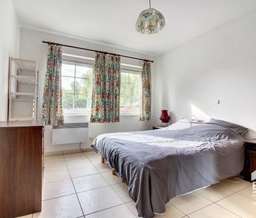 GELIJKVLOERS APPARTEMENT MET 2 SLAAPKAMERS - Photo 2