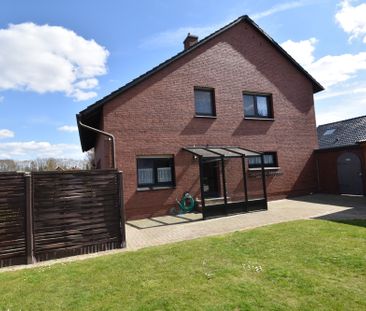 Erdgeschosswohnung mit Garage und Garten in schöner Wohnlage in Barßel - Foto 2