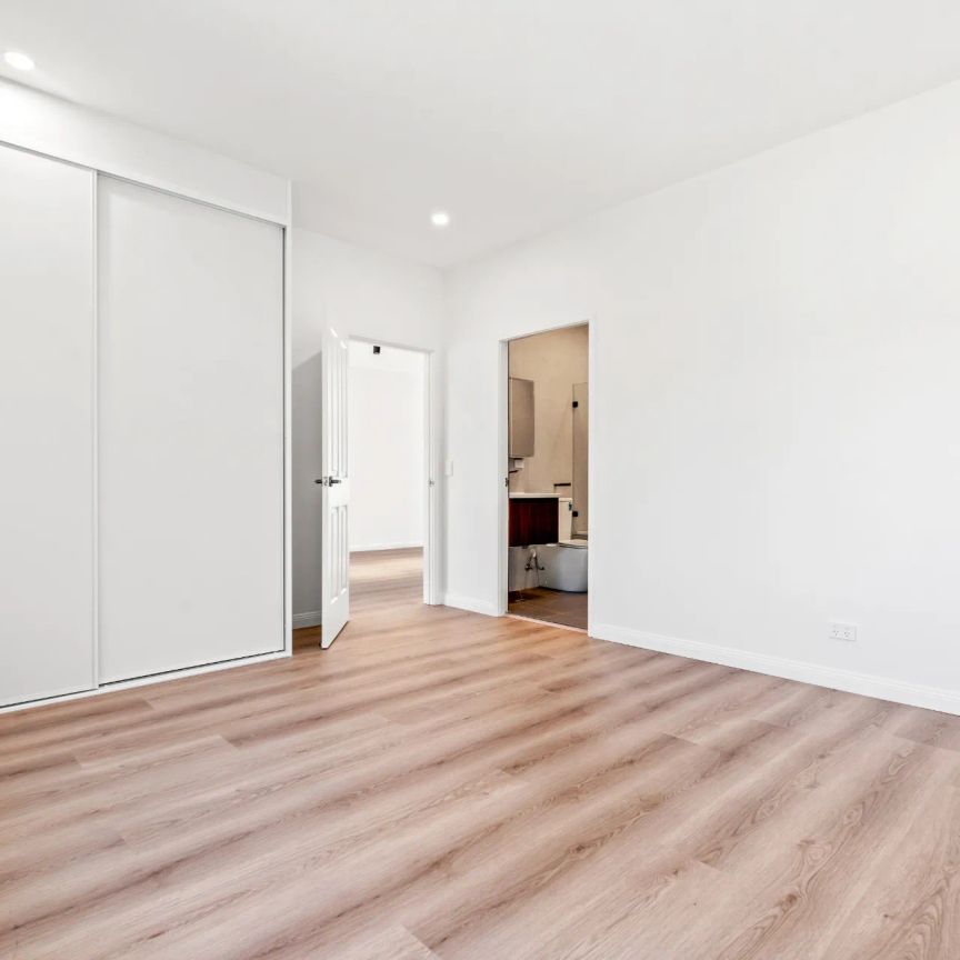 Immaculate Family Home - Freshly Renovated In Prime Location with Water Views - Photo 1