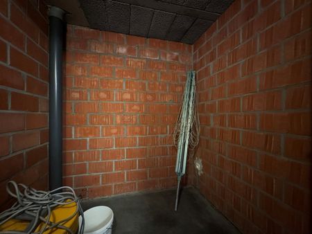 Gerenoveerd ruim appartement met tuin en garage gelegen in de wijk “Het Westveld”. - Photo 5