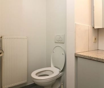 Gelijkvloers app met 1 slpk, terras, nabij station - Photo 3