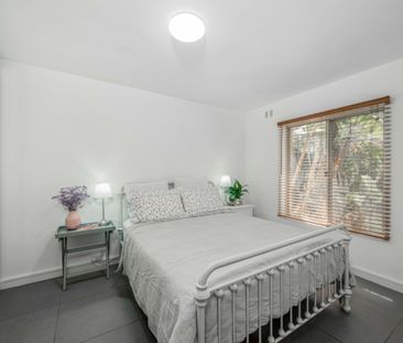 This stunningly finished one-bedroom, one-bathroom apartment stands... - Photo 6