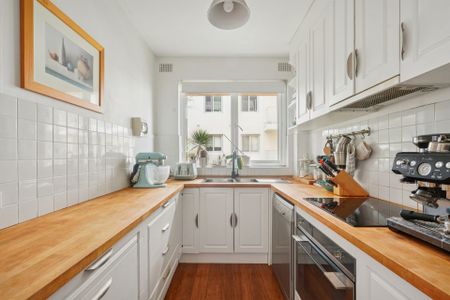 Updated Apartment With Coastal Locale - Photo 4