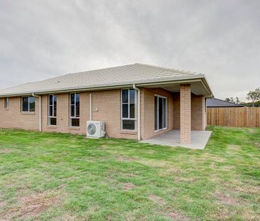 Modern and Well-Maintained Family Home in Prime Pimpama Location - Photo 1