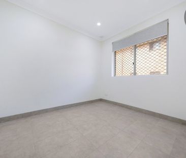 A Sunny 2-Bedroom in a Boutique Complex - Photo 1