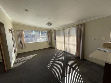 Spacious Three-Bedroom Home in Desirable Location - Photo 5