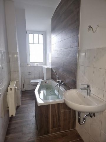 Gemütliche Dachgeschosswohnung in der Südstadt! - Photo 3