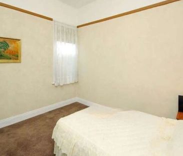 “Charming 2-Bedroom Home with Classic Character and Modern Comforts” - Photo 6