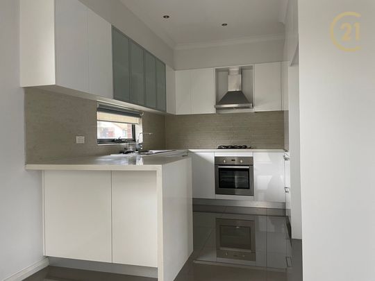 Beautiful, Modern & Spacious Townhouse! - Photo 1