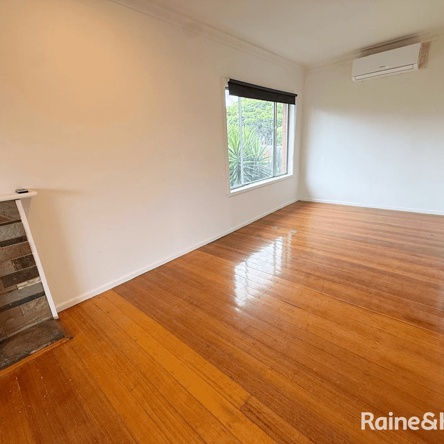 Charming Family Home with Spacious Yard in a Convenient Location - Photo 1