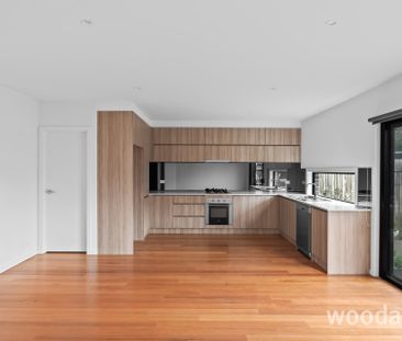 Stylish, Light-Filled Living in a Prime Location - Photo 3