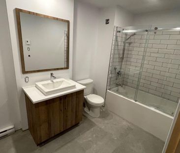 Grands 5½ demi-sous-sol, construction neuve - Photo 4