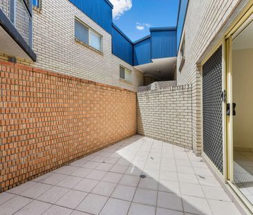 LOW MAINTENANCE WITH STUDY & COURTYARD - Photo 6