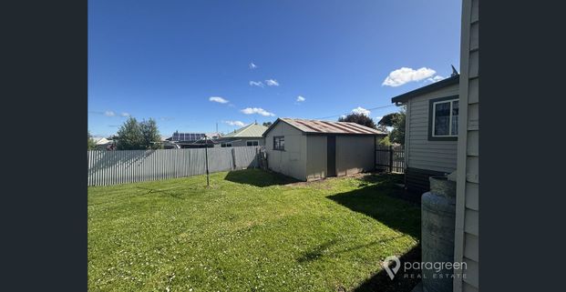 4 BED HOME WITH LARGE BACKYARD - Photo 1