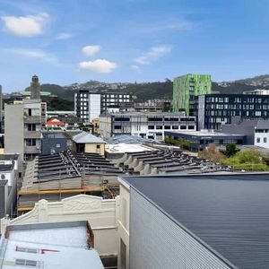 CENTRAL CITY APARTMENT LIVING - Photo 2