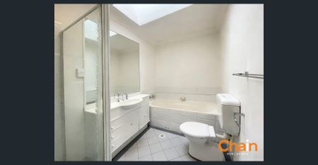 Bright & Spacious Full-Brick Townhouse in a Highly Convenient Location - Photo 4