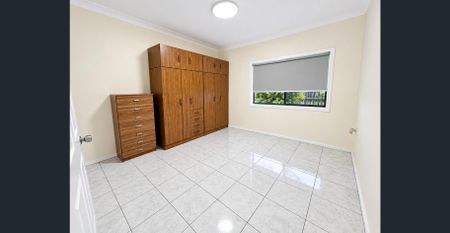 FOUR-BEDROOM HOME + SEPARATE TWO-BEDROOM RETREAT! - Photo 4