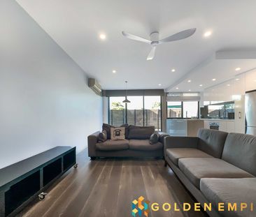 Modern Two-Bedroom Townhouse with Single Garage | Partially Furnished - Photo 1