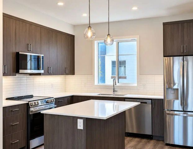 BRAND NEW 3 BED + DEN | 2.5 BATH | DOUBLE GARAGE | REDSTONE — 3 Bedrooms+ Den Townhouse - Photo 1