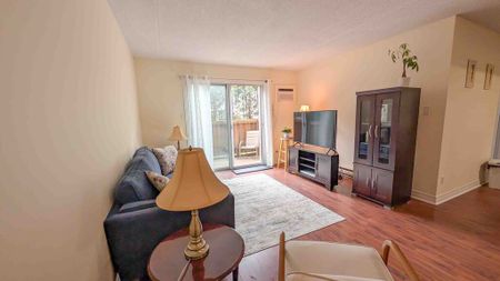 Modern Main Floor 2 Bedroom Apartment with Patio Space! - Photo 2