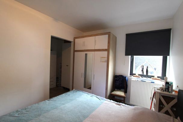 GELIJKVLOERS APPARTEMENT MET 2 TERRASSEN EN AUTOSTAANPLAATS - Photo 1