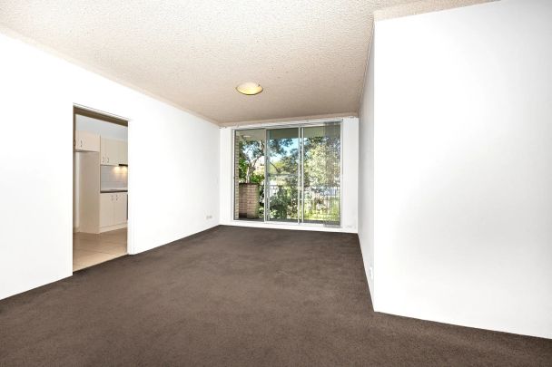 Spacious Two Bedroom Apartment with Parking in Ideal Location - Photo 1