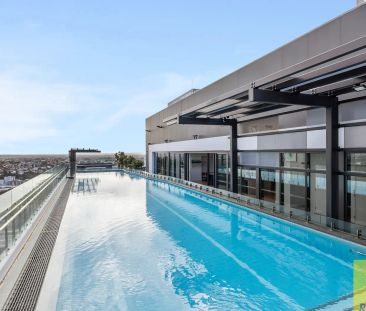 City Central Unfurnished Apartment with Resort-Style Amenities - Photo 3