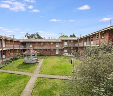 One Bedroom + Top Floor Balcony Apartment in the Belmore Gardens - Photo 2