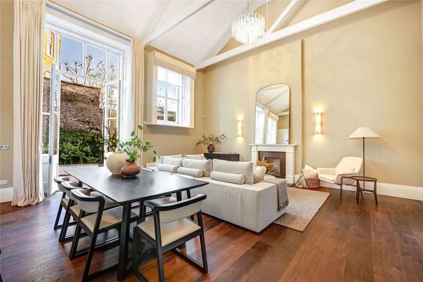 A Masterfully Refurbished Six-Bedroom Townhouse on Cranley Place - Photo 1