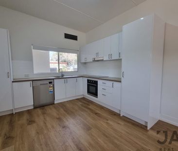 Renovated 2-bedroom unit on Joan - Photo 1